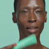 Woman applying Urban Skin RX Even Tone Barrier Repair Ceramide Cream to her face