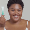 Woman applying Urban Skin RX Hydrating Lip Treatment to her lips