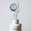 Urban Skin RX Acne Serum + Spot Treatment being squeezed out of applicator tip