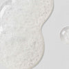 Clear sample of Lacticglow Micropolish Gentle Cleansing Gel with microbeads that gently exfoliate