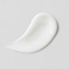 A white swatch of the fragrance free Clear Complexion Acne Serum + Spot Treatment  which shrinks unsightly pimples