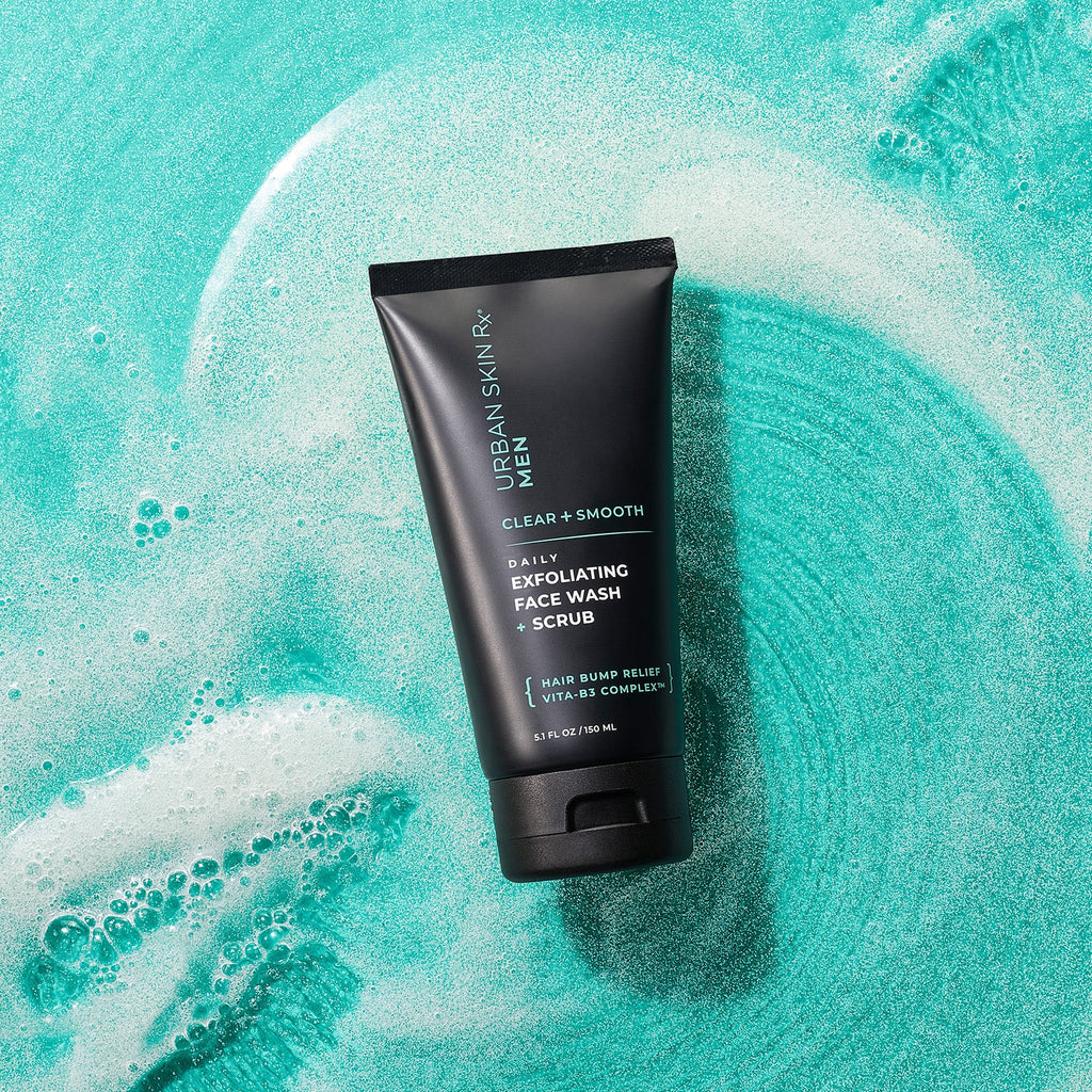 5.1 ounce Bottle of Urban Skin RX Men's Exfoliating Face Wash + Scrub on a light blue background