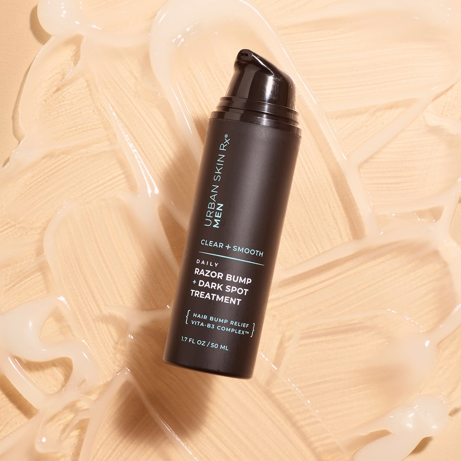 Bottle of Urban Skin RX Razor Bump + Dark Spot Treatment with swatches of product showing texture of cream